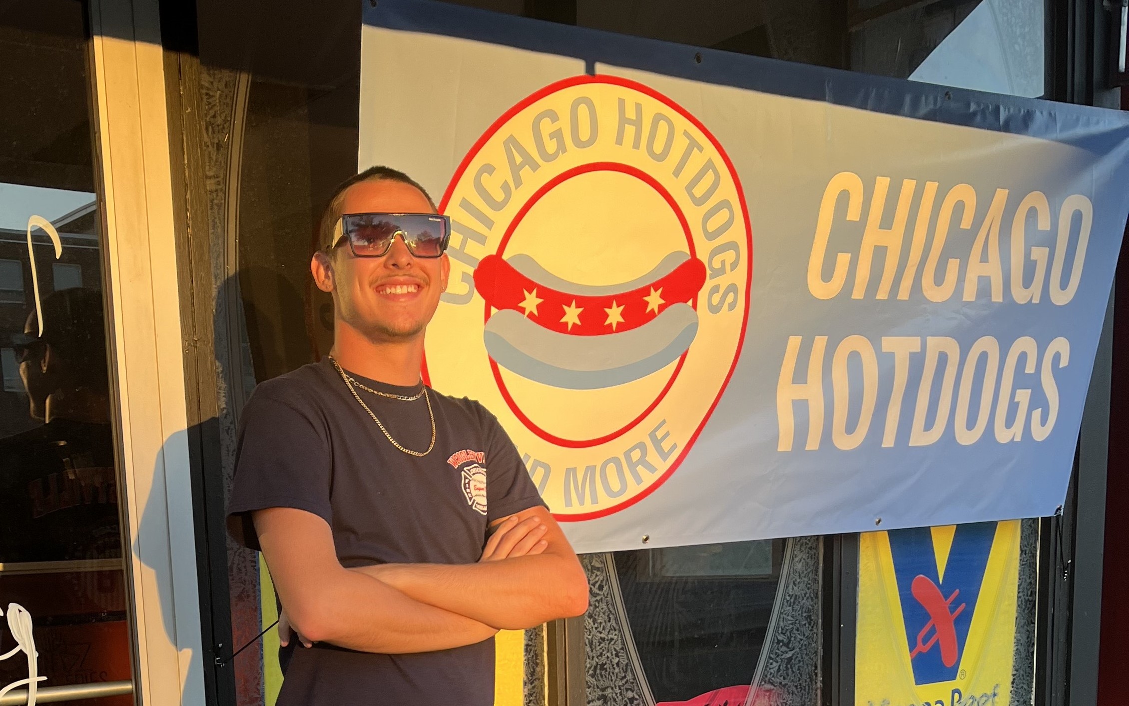 Elijah Krawczykowski in front Chicago Hotdogs & More