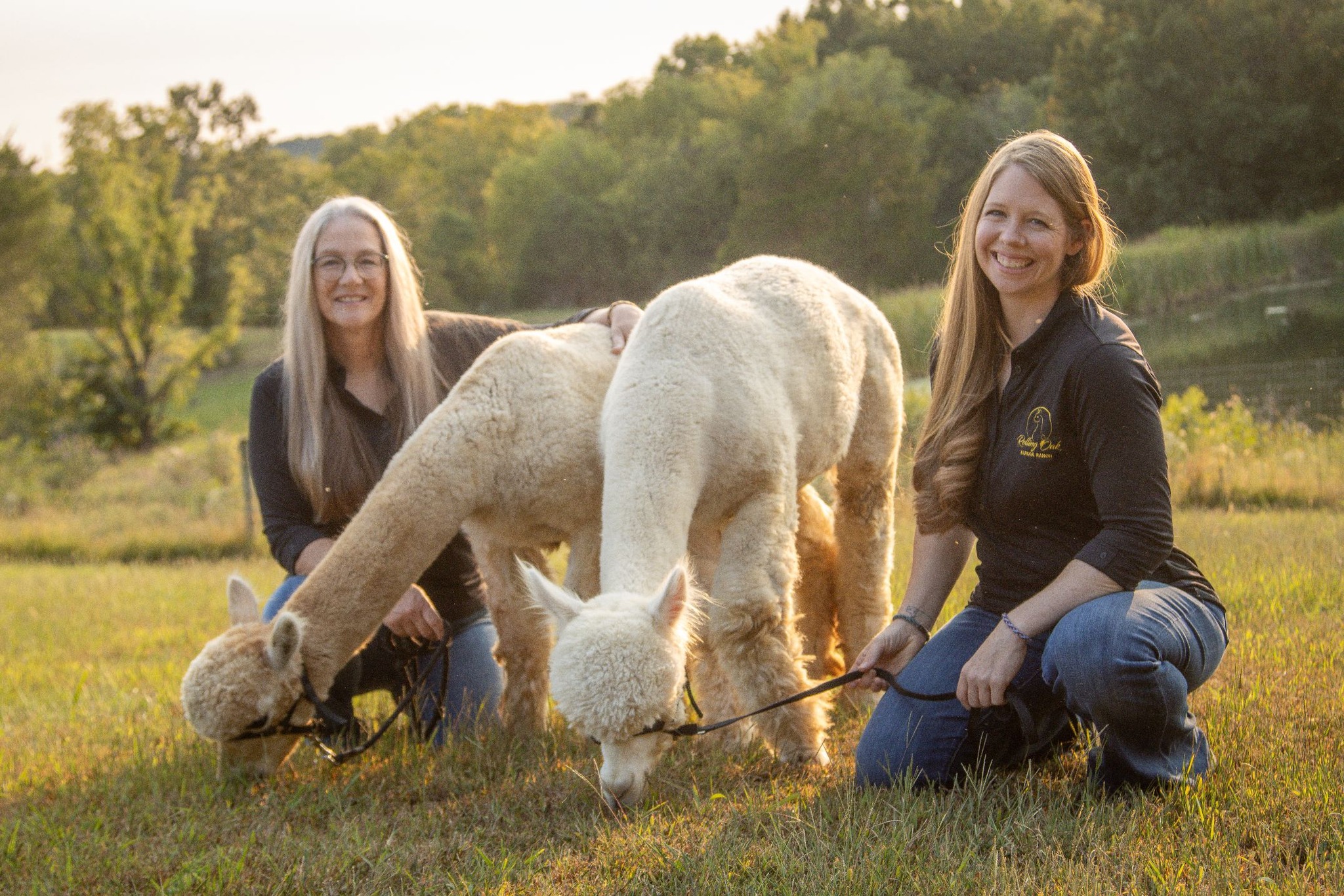 Mother-daughter team Judy Hoepker and Morgan Stevenson with two of their alpacas. 