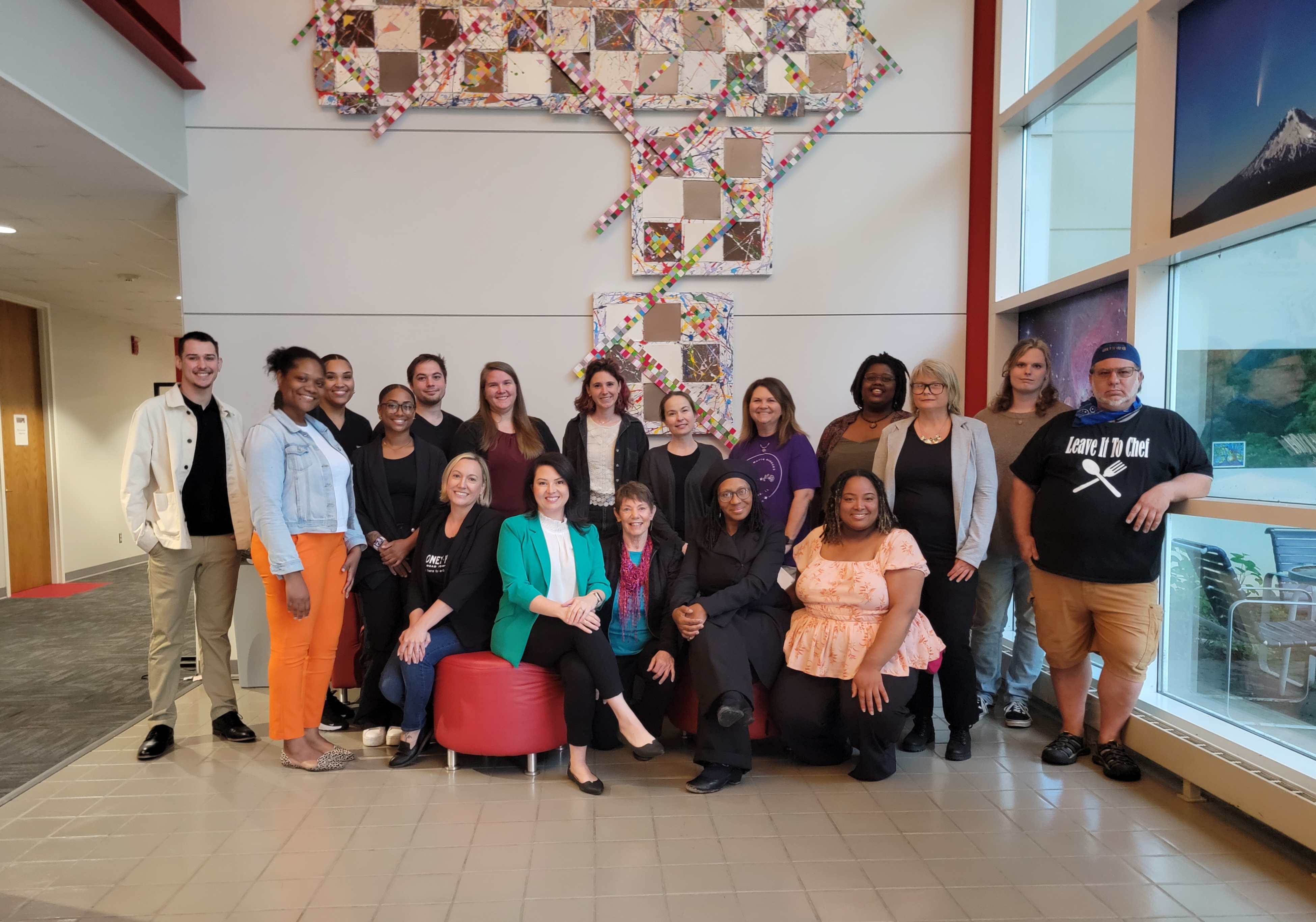 A large group of people, the Carbondale Accelerator Program Participants, pose for a photo and the Dunn-Richmond Economic Development Center. 